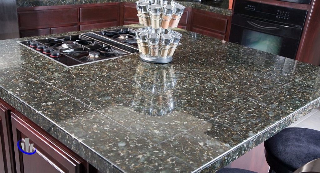 What are the factors to be considered while choosing a countertop material? 