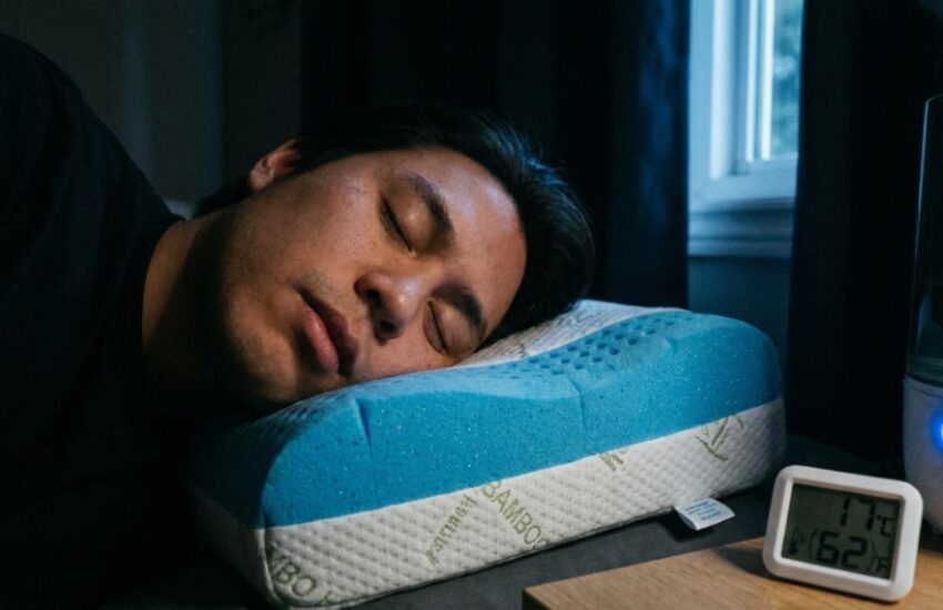 A luxury cooling memory foam pillow on a freshly made bed with breathable white sheets.